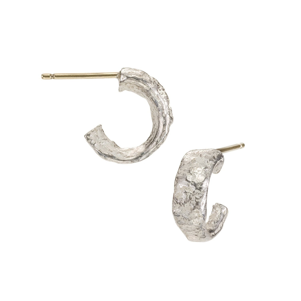 Angled views of Small Molten Hoop earrings in sterling silver by Betsy Barron Jewellery