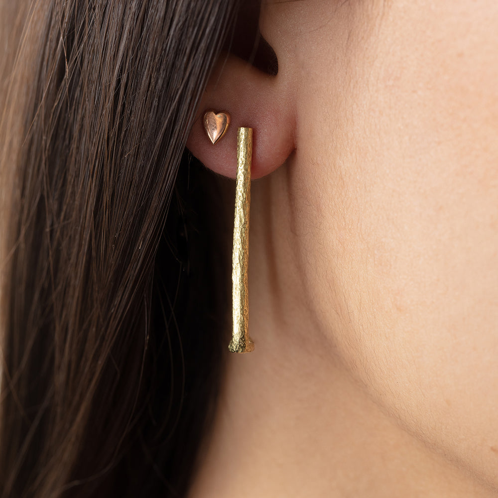 
            
                Load image into Gallery viewer, Detail view of model wearing Tallboy Hoop in right ear
            
        