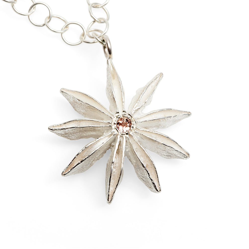 Detail view of sterling silver Star Anise Necklace with citrine gemstone