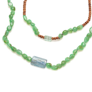 Detail view of Vacation Necklace with pebble green garnets